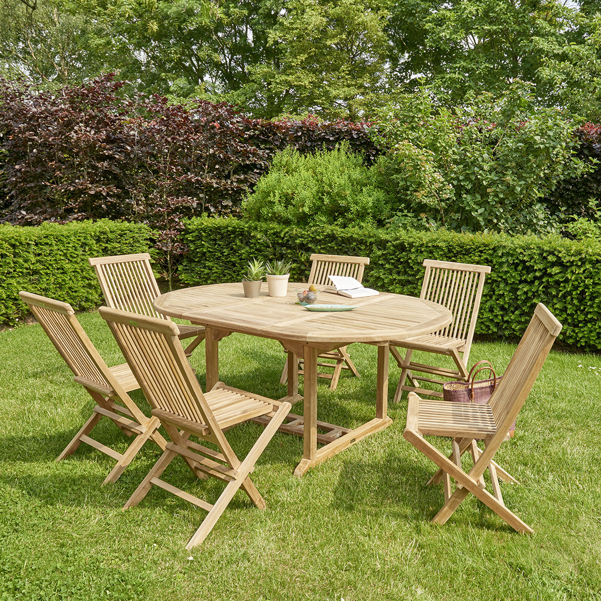 20-table_de_jardin_en_teck_massif_extensible_ovale_6_8_pers-06.jpg