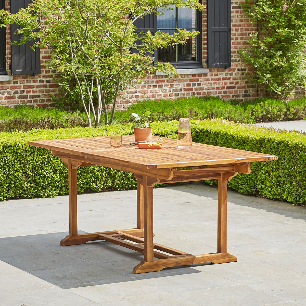 BALI - Ausziehbarer Gartentisch aus geöltem Teakholz für 8/10 pers.