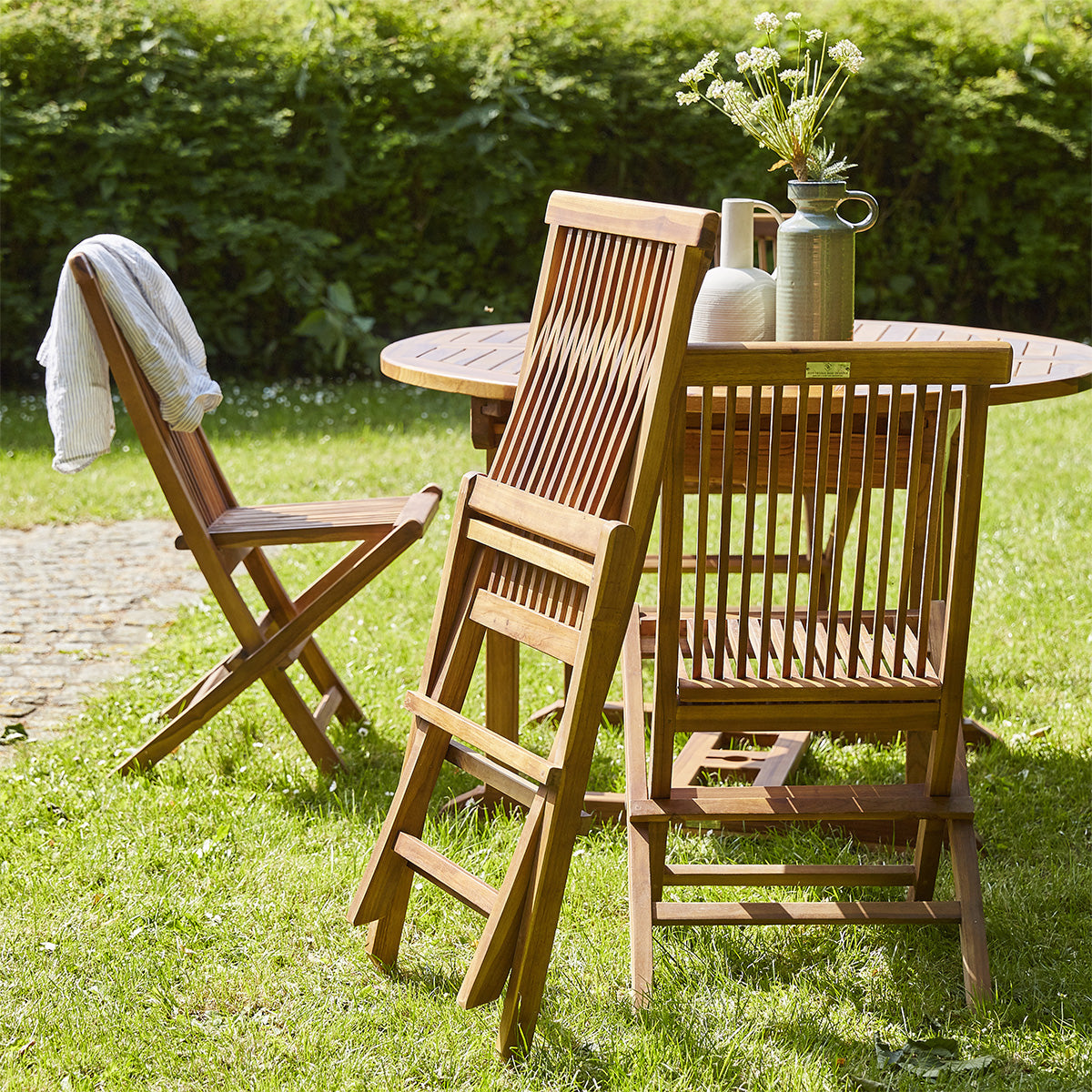 BALI - Ausziehbare Gartenmöbel aus geöltem Teakholz für 6/8 Pers.